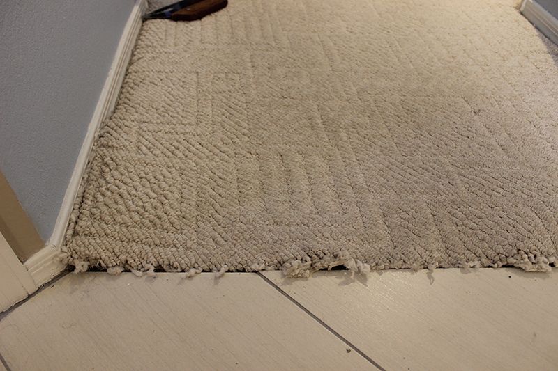 Carpet to Tile Transition before repair